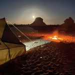 white desert camping vs hotel